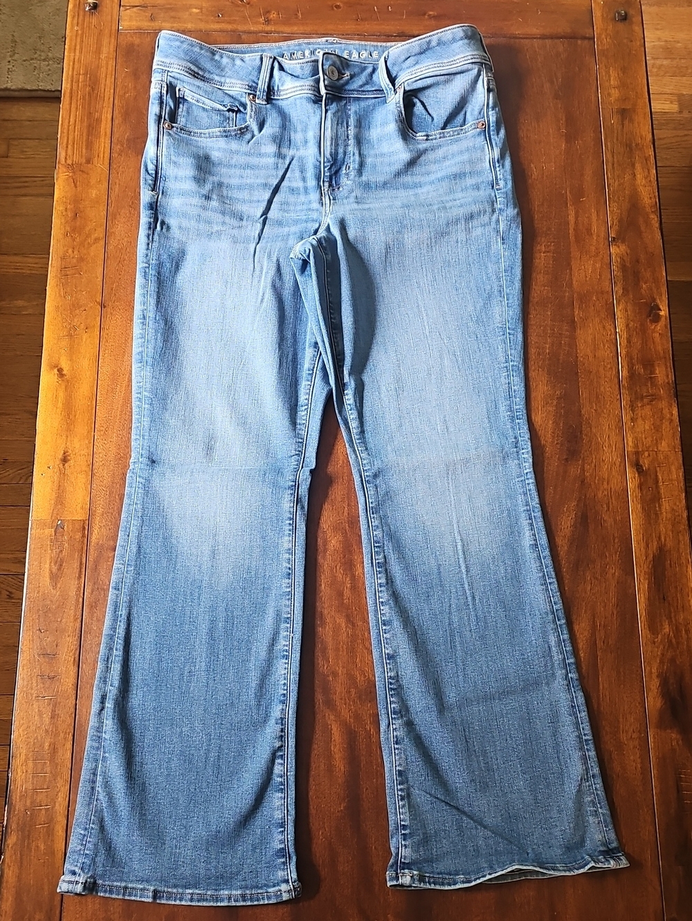 American Eagle Kick Boot Next Level Stretch Flared Jeans. Light Blue. 12 SHORT